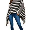 Black and White Poncho $12.00 - Goldie B & Co Boutique