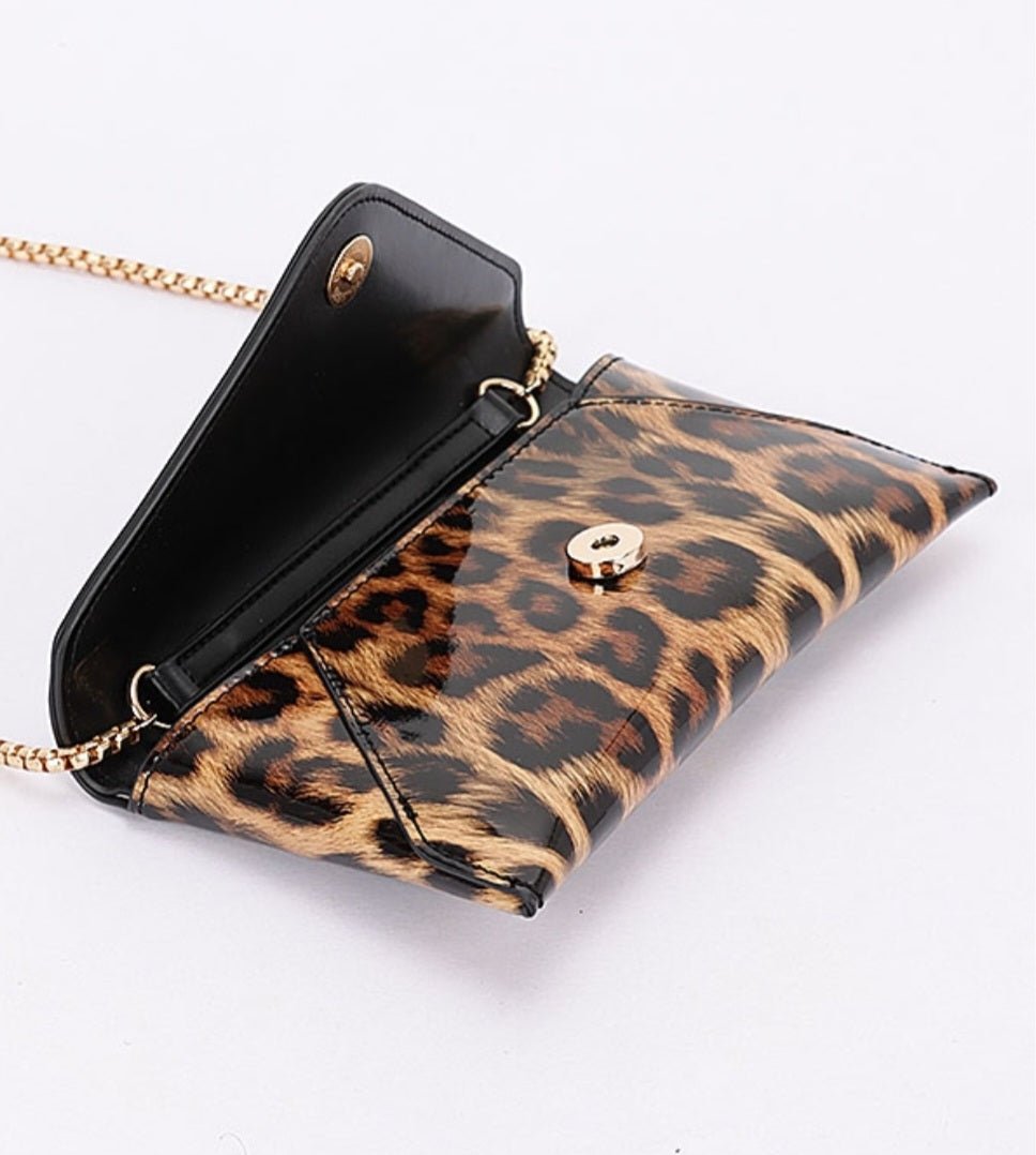 Leopard Envelope Clutch $25.00 - Goldie B & Co Boutique