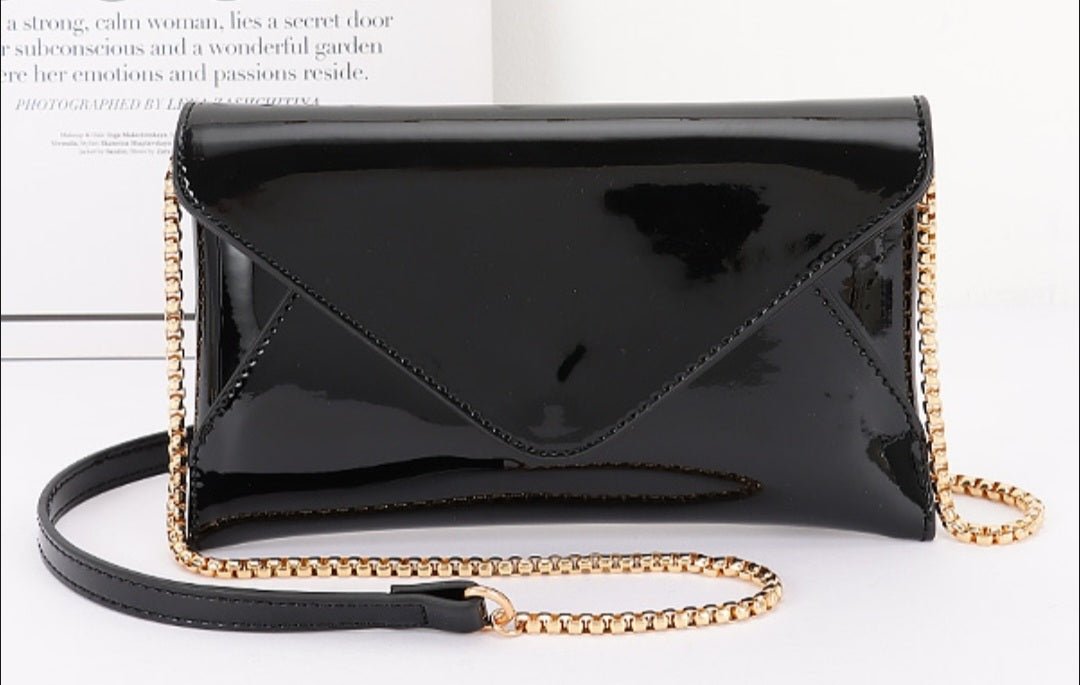 Solid Envelope Clutch $25.00 - Goldie B & Co Boutique